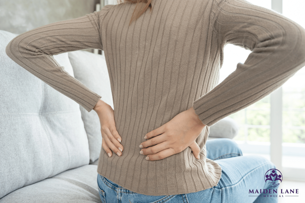 A woman with chronic back pain in New York.