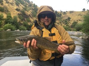 Dr. Kaufman with fish in hands