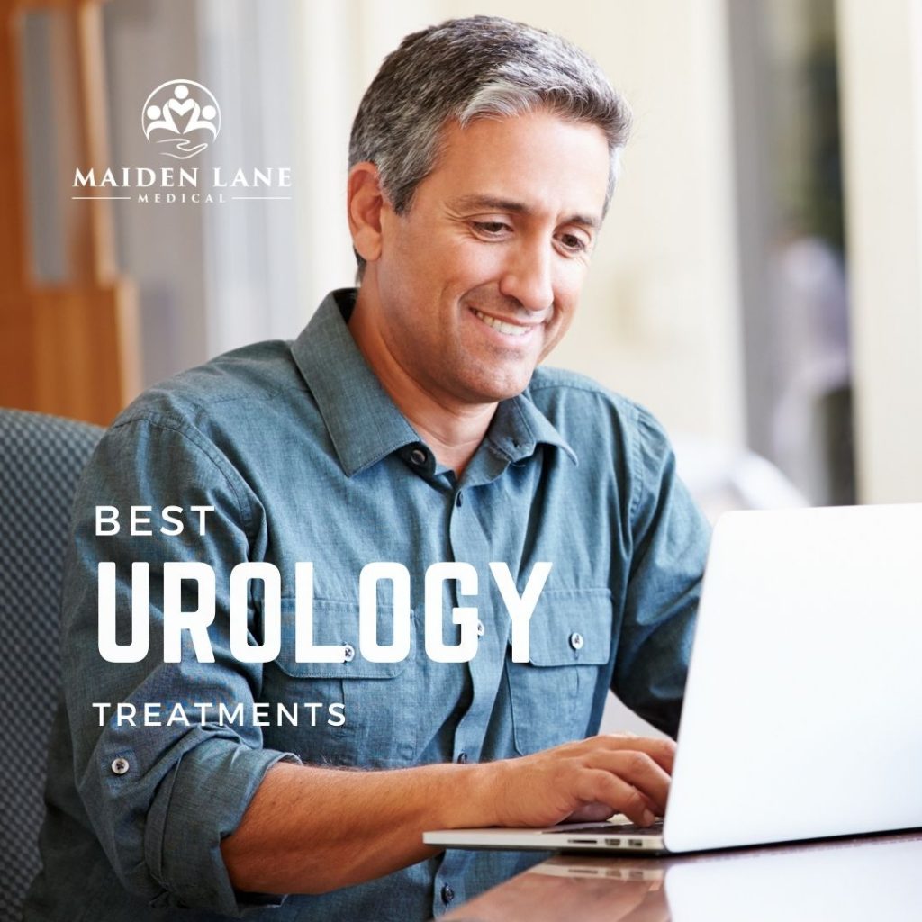 Man searching in computer for men's health urology treatments - Maiden Lane Medical, NYC