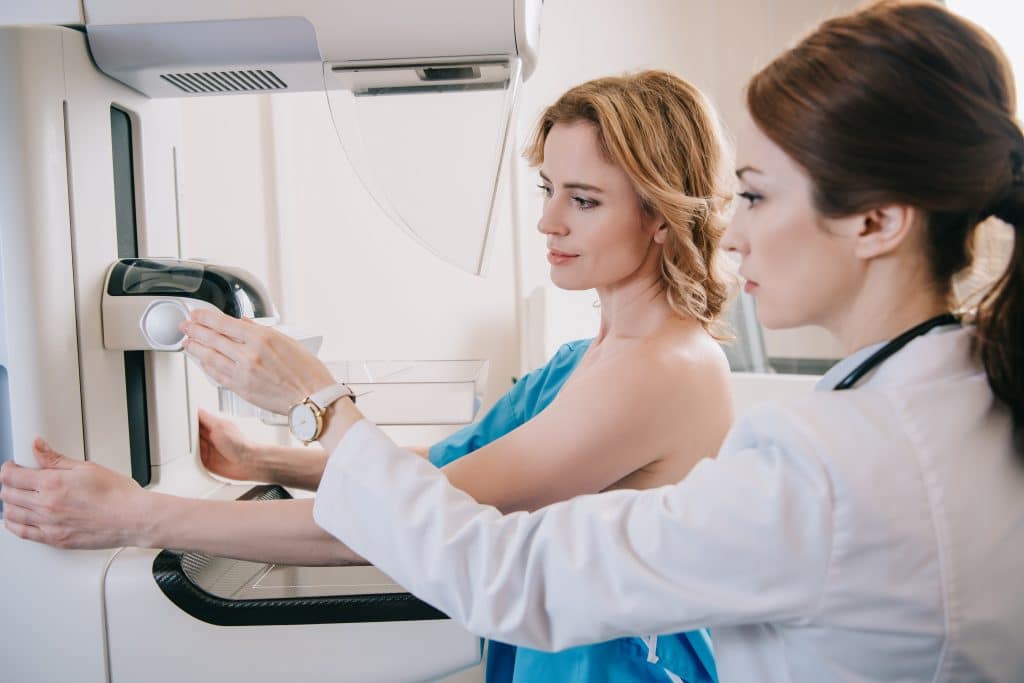 Woman receiving Screening And Diagnostic Mammography Services
