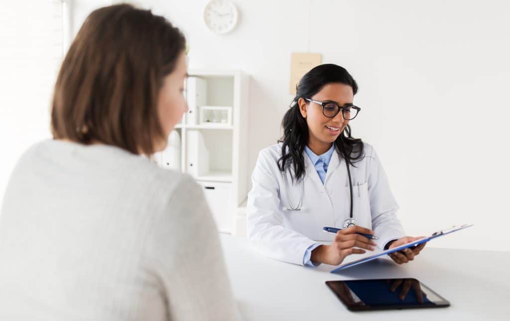 Doctor and patient discussing Mammography Services