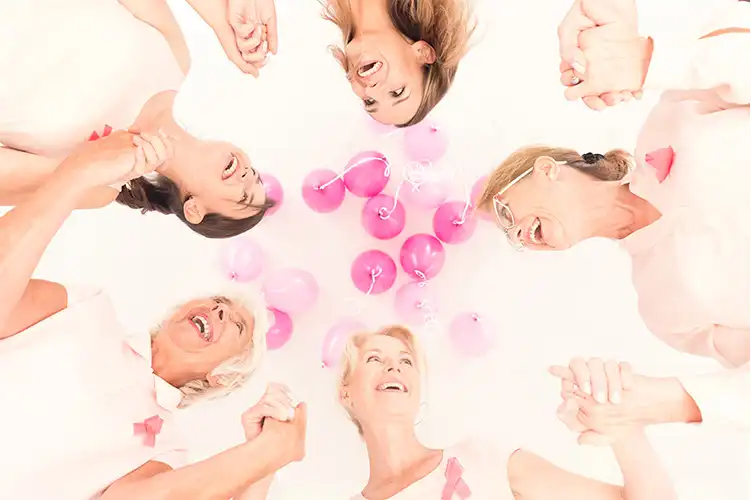 Patients of Maiden Lane Medical holding hands and sharing testimonials of their treatments.