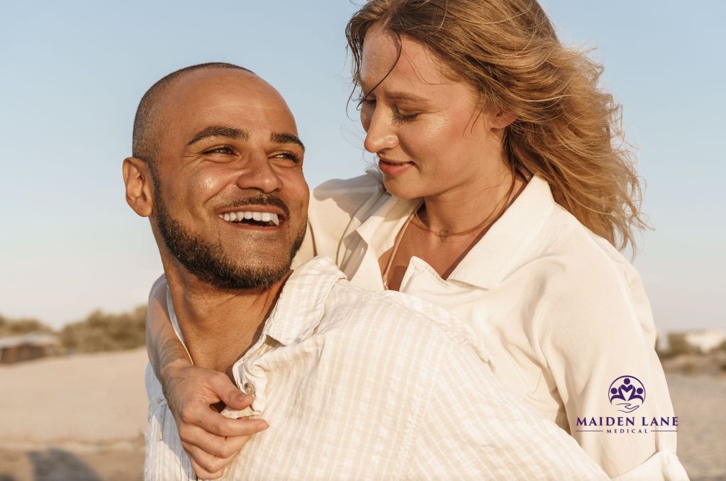 Happy couple after visiting an erectile dysfunction specialist in Manhattan, NY.