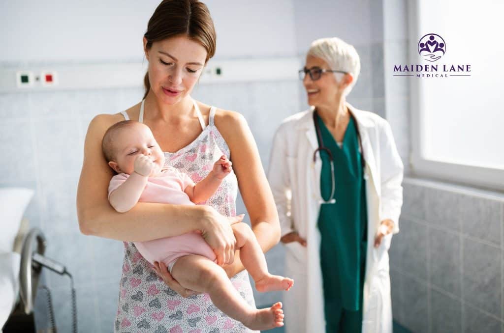 A mother with her newborn baby visiting her OB/GYN in NYC.