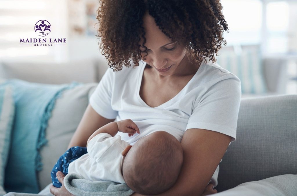 A nursing mother after getting breastfeeding support from Maiden Lane Medical.