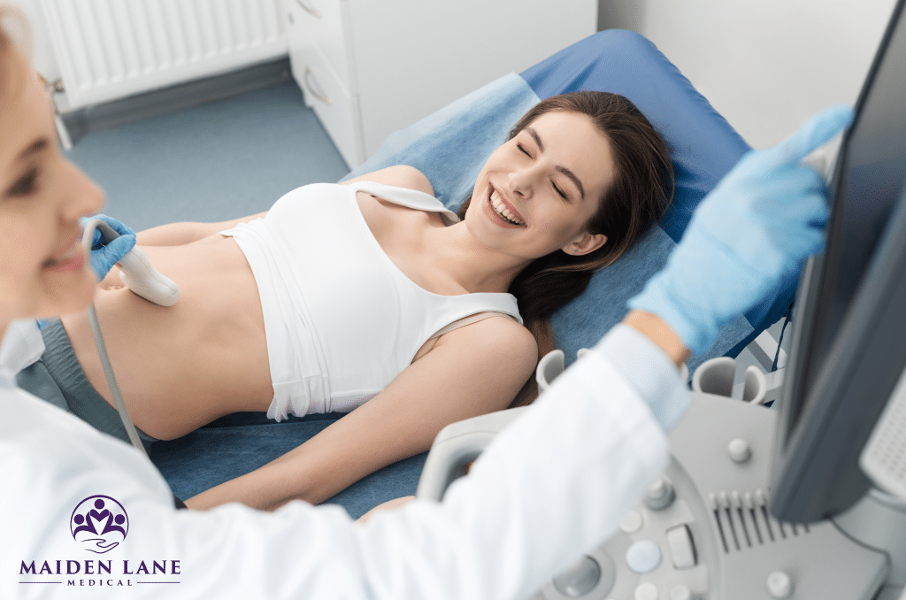 A woman getting an ultrasound at a gynecology appointment.