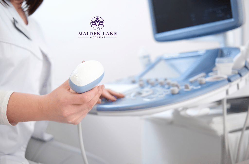 gynecologist performing breast ultrasound for cancer screening.