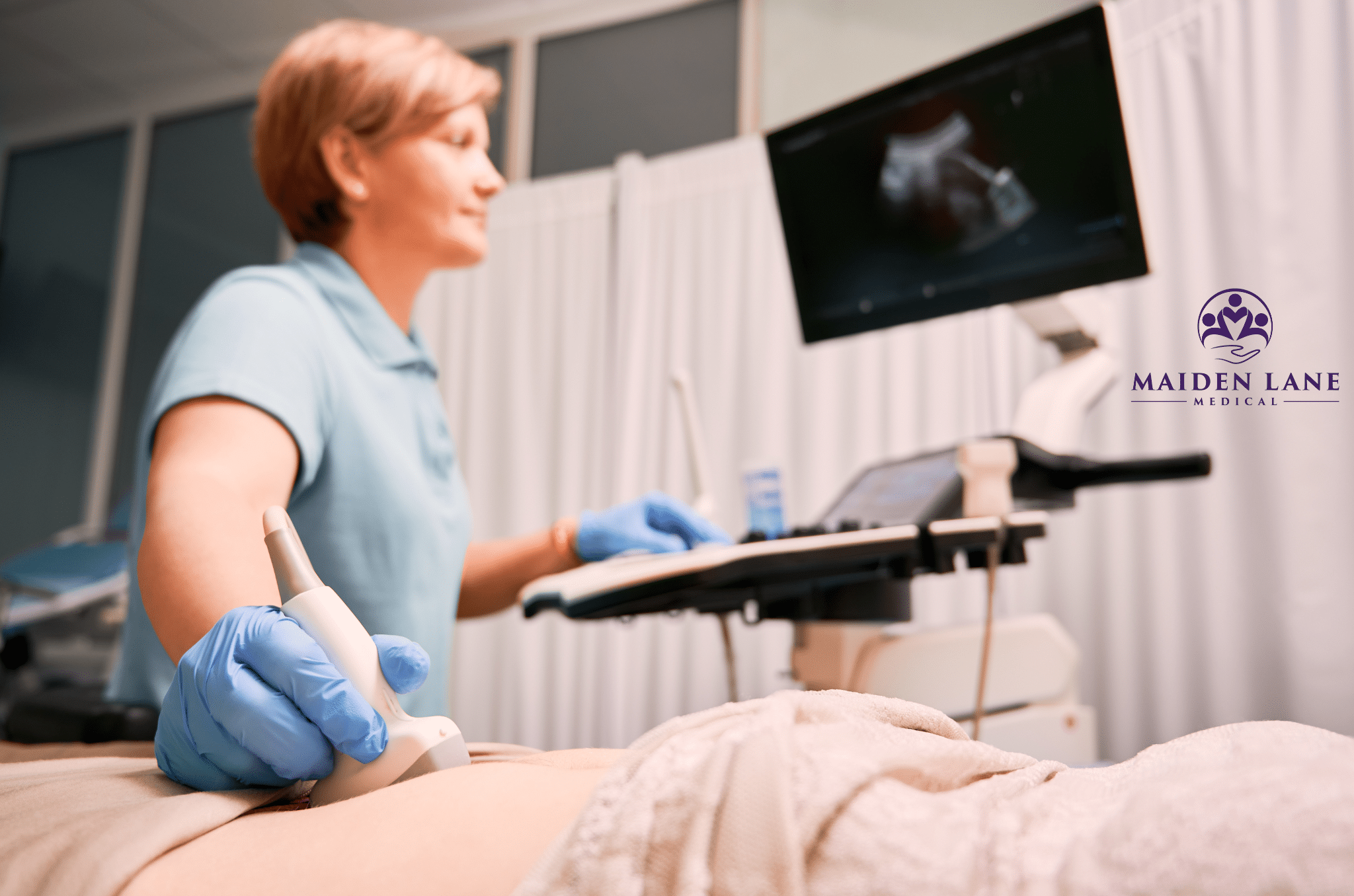 A woman getting an abdominal ultrasound.