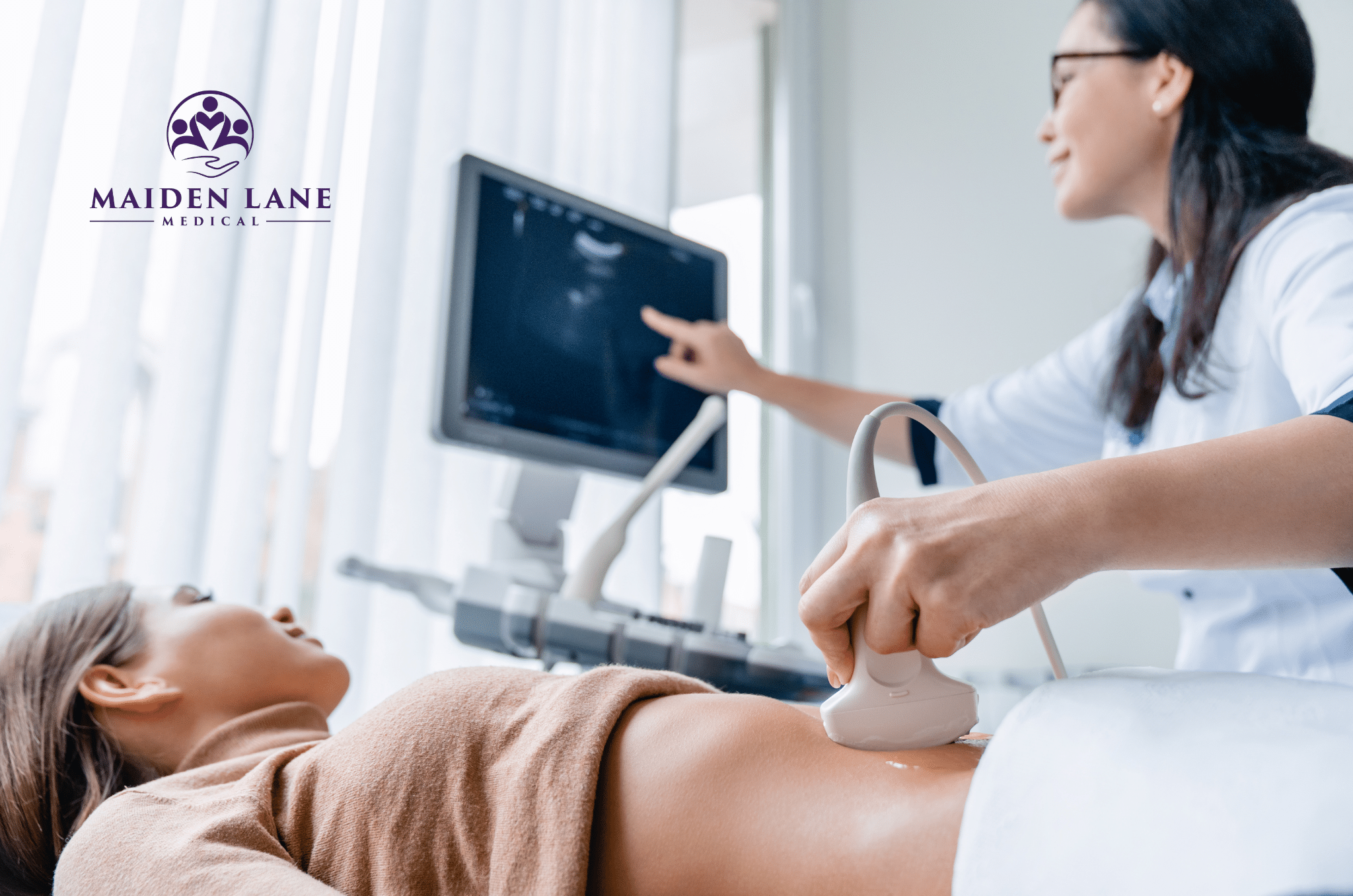 A woman having a pelvic ultrasound in NYC.