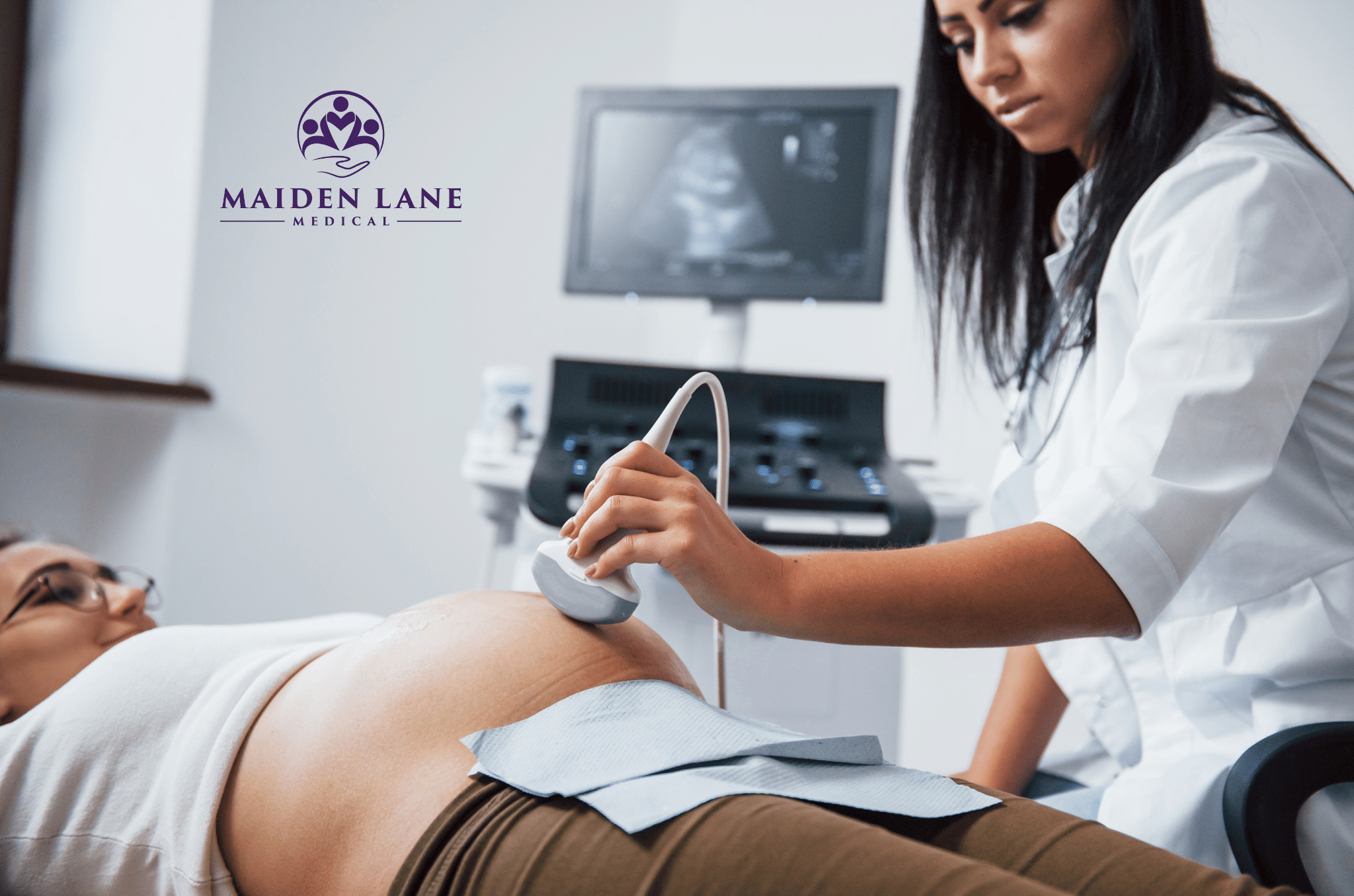 A pregnant woman having a pregnancy ultrasound in Manhattan, NY.