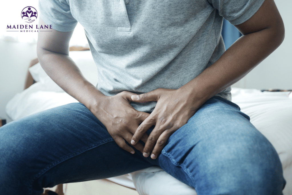 A man experiencing pain caused by chronic prostatitis in Manhattan, New York.