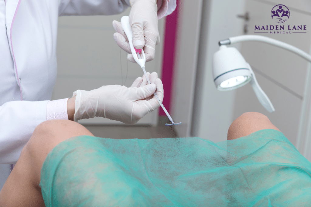 A woman having an IUD placed by a specialist in Manhattan, New York.