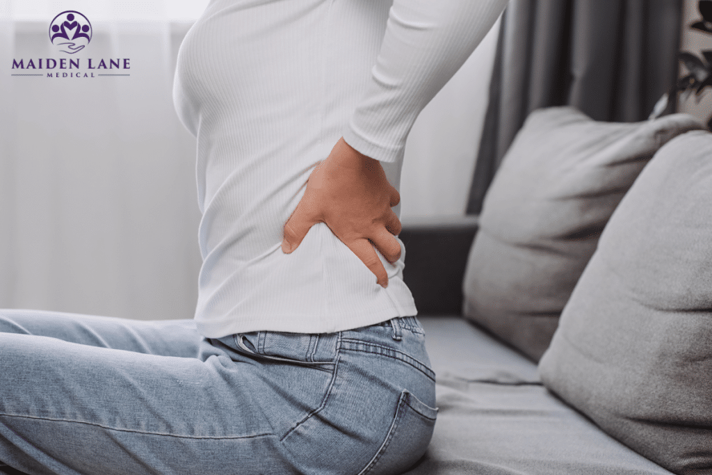 A woman with a strained back in Manhattan, New York.
