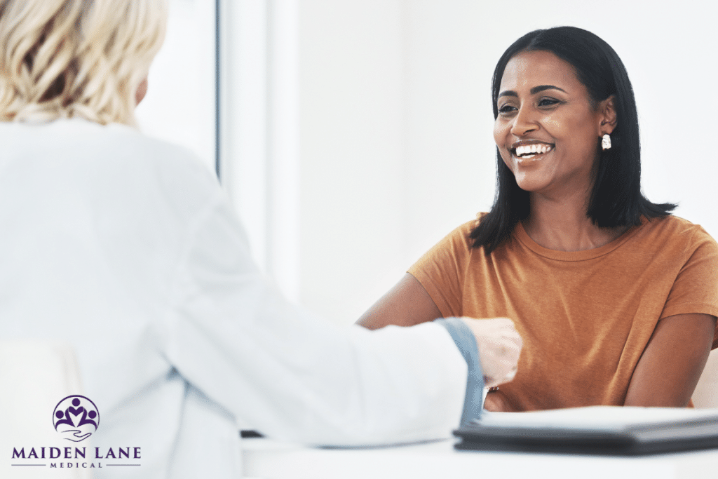 A woman is happy at the doctor for a checkup after a hysterectomy in Manhattan, New York.
