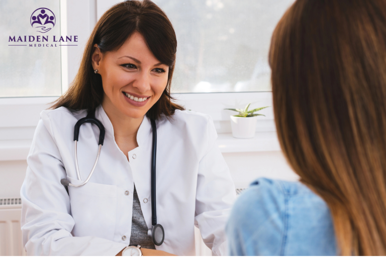 A woman at the doctor for abdominal scar revision in Manhattan, New York.