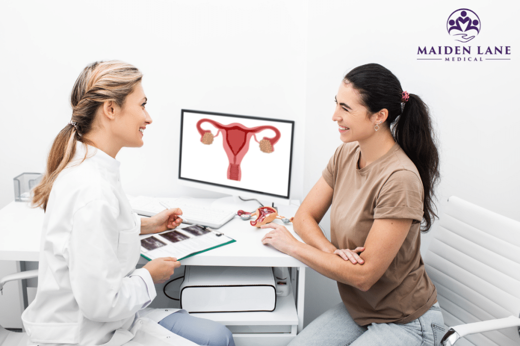 A woman at the doctor for a birth control consultation discussing tubal ligation in Manhattan, New York.