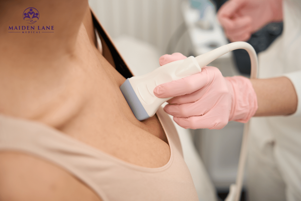 A high-risk breast cancer patient undergoing a breast ultrasound to detect any changes in breast tissue, aiding in potential early detection of breast cancer in New York, Manhattan.