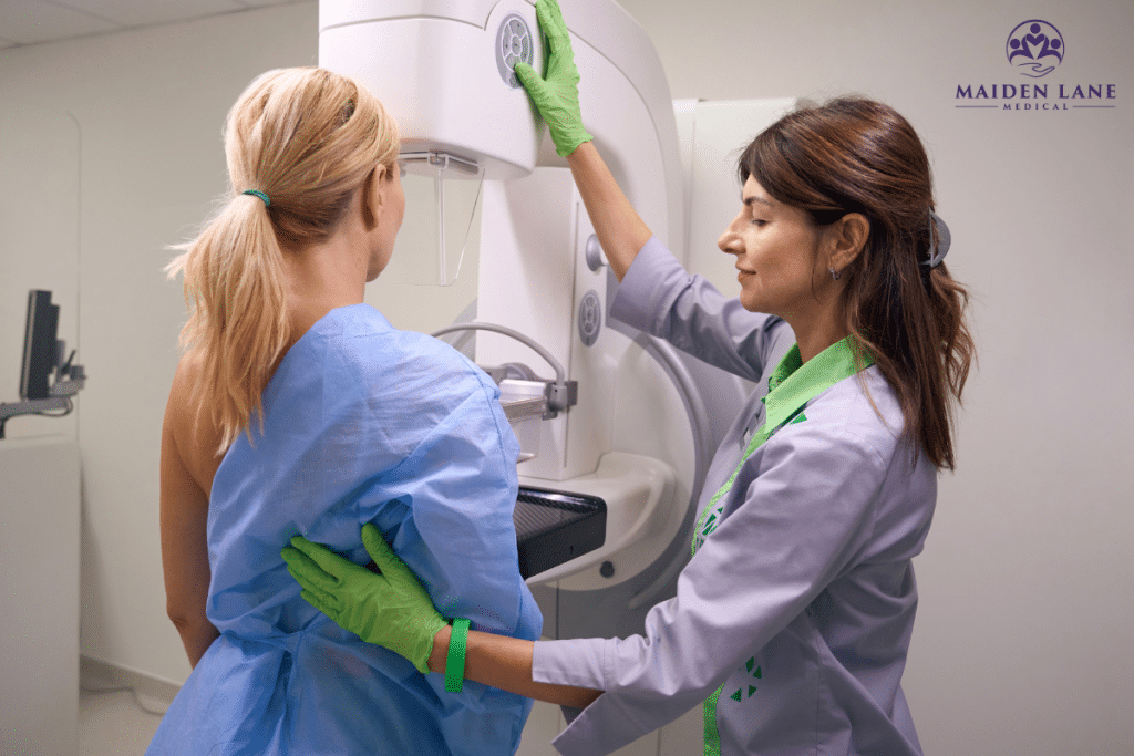 A woman that is at high risk for breast cancer undergoing a mammogram to detect any changes in breast tissue in New York, Manhattan.